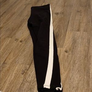 Black leggings with white stripe down both sides